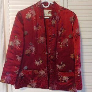 Beautiful embroidered and padded Chinese jacket.  Size small. Rayon.